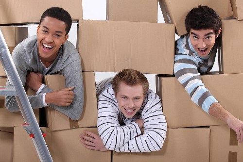 Student storage boxes and suitcases arranged in a Dulwich storage space