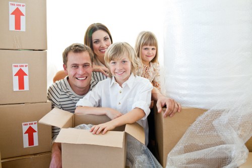 Student packing items carefully before placing them into storage in Dulwich